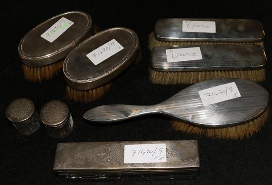 A pair of silver brushes, 3 others and 3 silver jars